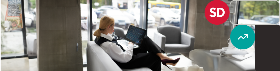 Working on her computer and Selecting the Best ISC2 Certification for You